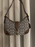 Signature jacquard canvas in a beige/taupe and brown pattern