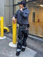 Vault Form relaxed black jeans street-style reference